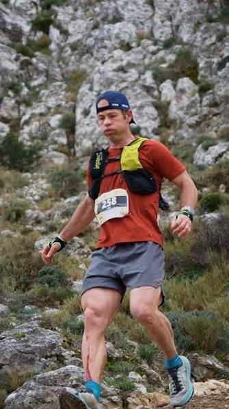 Pere Aurell on a rocky trail with bib number 258